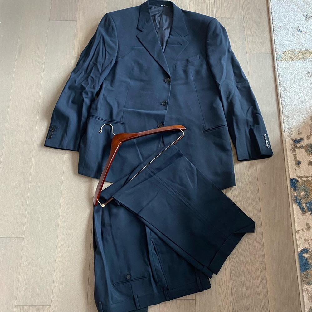 Men’s black Armani suit